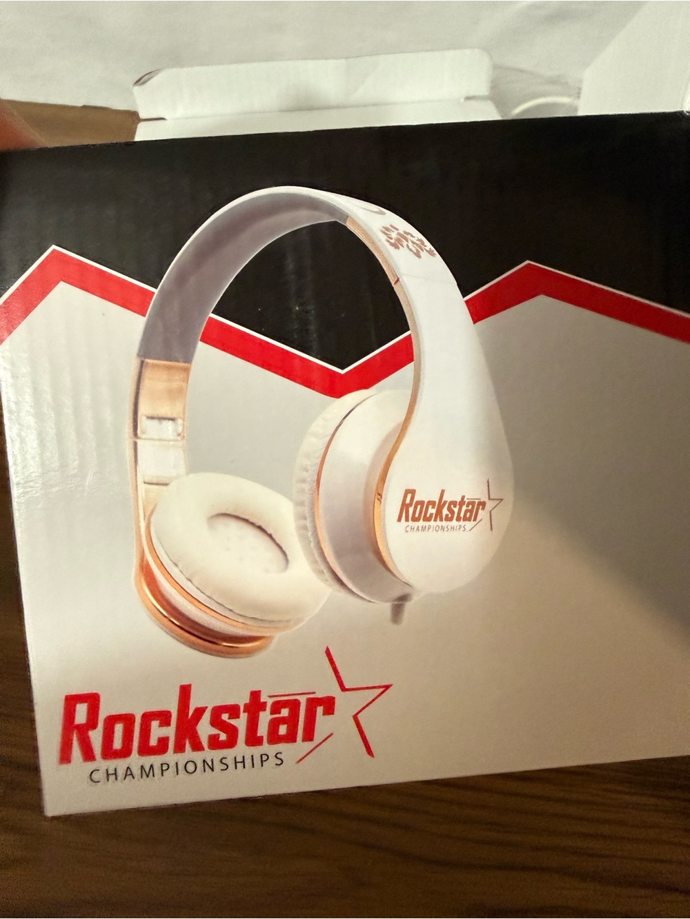 Rock star Champion rose gold headset. Full ear coverage
